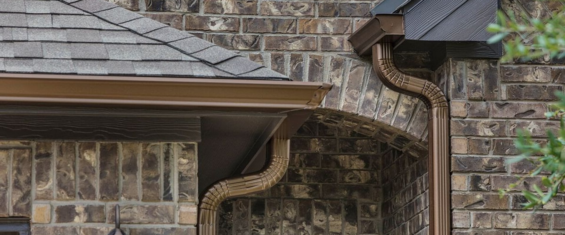 Should rain gutters be installed when replacing a roof in Texas?